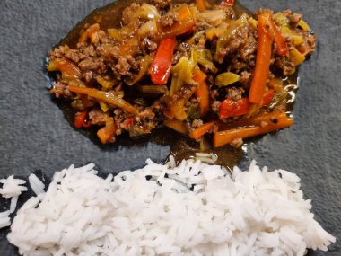 asian kitchen spicy curry with vegetables and rice