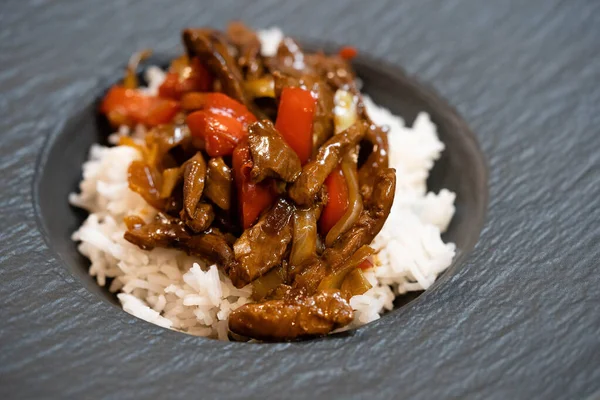 Stock image asian kitchen spicy curry with vegetables and rice