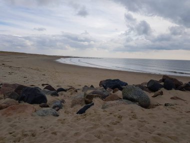 Kuzey denizindeki uçsuz bucaksız sahil Hvidbjerg Stranden Blavand Danimarka