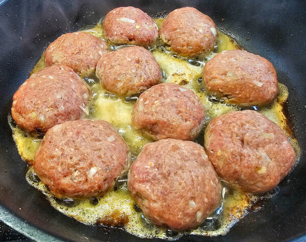 Fried meatballs with cabbage and parsley potatoes