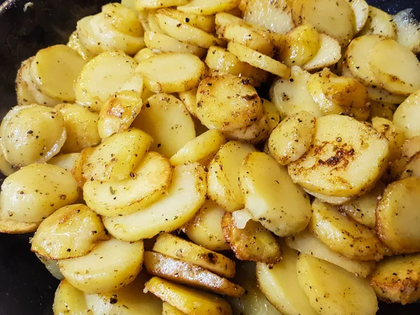 roasted potatoes with bacon onions and spices