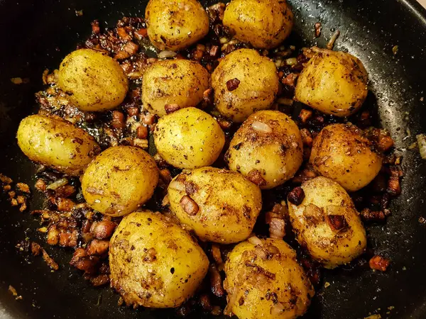 roasted potatoes with bacon onions and spices