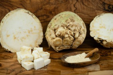 Taze kereviz, Apium zeytin odununun üzerine gömülür.