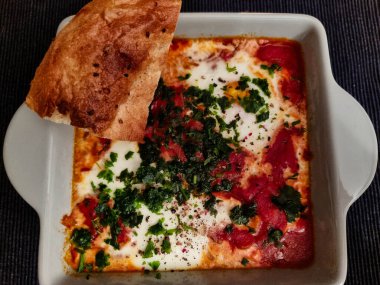 Shakshuka, Kuzey Afrika ve Levantine mutfağının bir özelliğidir.