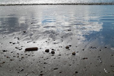 Blavand Danimarka 'nın kuzey denizindeki uçsuz bucaksız plajın izleri.