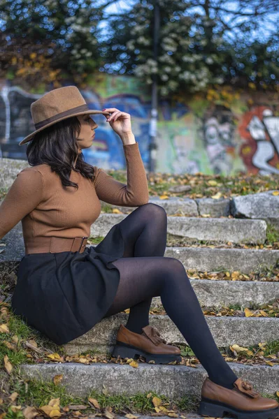 Thoughtful Woman Sitting Stairs Brown Hat Autumn Foliage River Bank — Stock Photo, Image