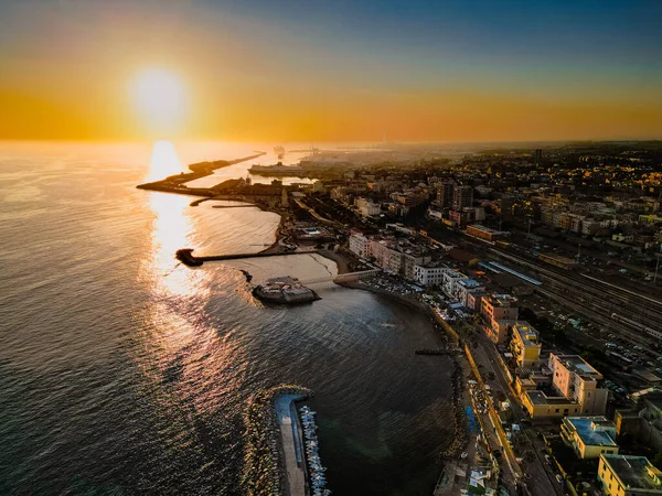 Panorama at sunset from above of an Italian seaside city.
