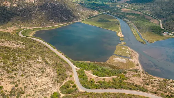 Güney Sardunya Denizi, kristal berrak su ve tekneler