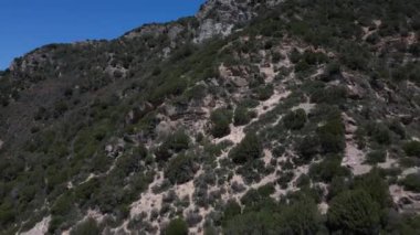 Güney Sardunya Denizi, kristal berrak su ve tekneler