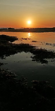 Bali Endonezya sahilinde güzel bir gün batımı