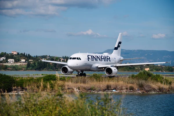 stock image Kerkyra, Greece - 09 24 2022: Finnair Plane On Corfu Airport. Mastery of experienced pilots is needed For Taking off and landing on the shortest runway. High quality photo