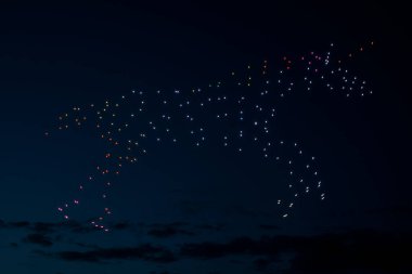 Riga, Latvia - 27.04.2023: Baltic Drone Show, Simulation of a unicorn by drones. High quality photo clipart