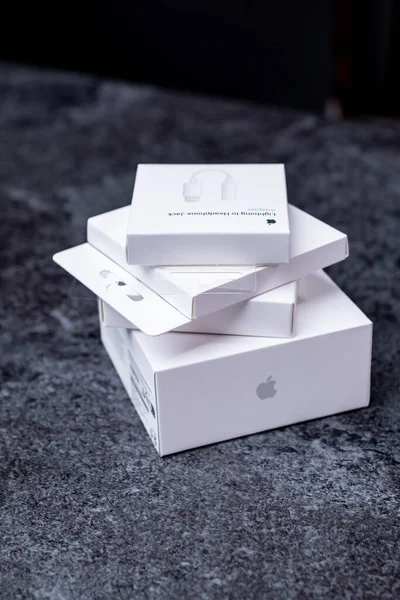 stock image Jurmala, Latvia - 21 09 2023: Four white boxes from Apple devices are in a stack. First unboxing - AirPods pro 2, MagSafe Charger, AirTag, Adapter from Lightning to Headphone Jack. High quality photo