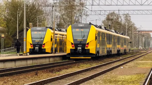 stock image Jurmala, Latvia - 25 04 2024: Two new VIVI trains await passengers at Sloka station, showcasing modern design and efficiency. . High quality photo