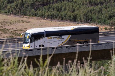 Cape Town South Africa.  Flatbed lorry loaded with white sacks entering the port of Cape Town via the South Arm entrance 2023.