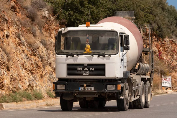 stock image Crete, Greece, Europe. 2023. An old cement truck driving along a highway in Greece, Europe.