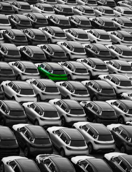 Zeebrugge Belgium Europe. 21.12.2024. New cars including a green model parked on the dockside for export and import in. the motor trade.