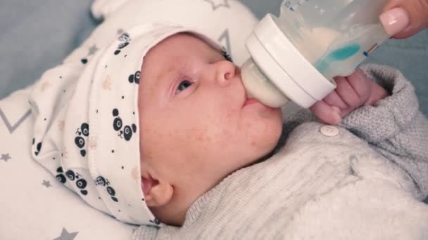 Pretty Baby Girl Drinks Milk Bottle Lying Bed — Stock Video