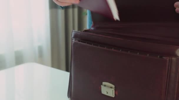 Business Man Suit Puts Notebook Brown Classic Bag Leaves Meeting — Stock Video