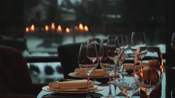 Glass Glasses White Plates Candles Burning Dark Interior Restaurant Decor — Stock Video
