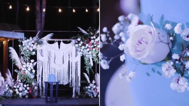Stor Vacker Bröllopstårta Dekorerad Med Blommor Kvällen Nära Bågen Medellång — Stockvideo