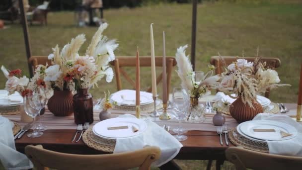 Close Table Served Decorated Candles Dried Pastel Flowers Boho Style — Stock Video