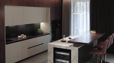 Bu şık ve modern mutfak, güzel ve şık dolapların yanı sıra bar oturma seçenekleri sunuyor.