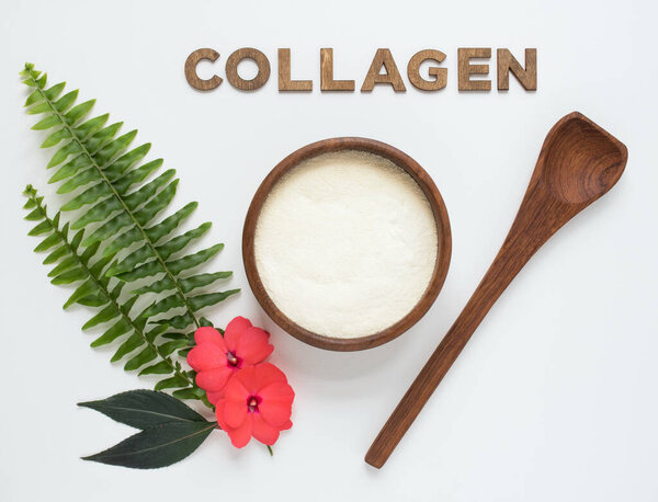 Collagen Peptides in Bowl with Fern and Flowers