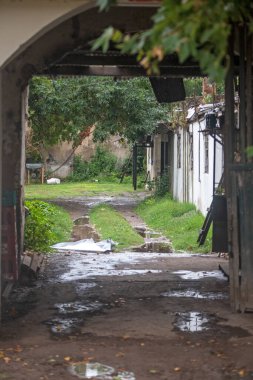 old abandoned house with arch