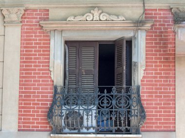 Balcony of old brick house
