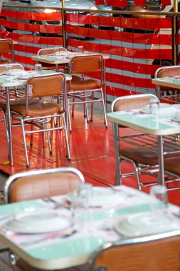 Tables and chairs in cafe or restaurant