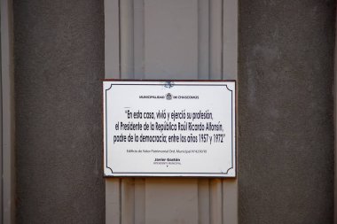 Chascomus, Argentina, Plaza Independencia in the historic center. House painted dark gray; it is the home that the family of president Raul Ricardo Alfonsin lived in between 1957-1972. A plaque reminds us that they also had their law office there.  clipart