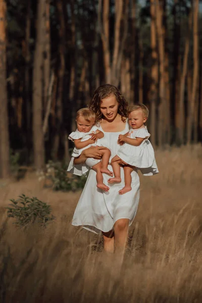 Family Walks Middle Nature Two Children Twin Sisters Mother Holds — Stock Photo, Image