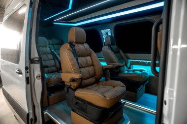 Comfortable interior of a passenger bus with soft seats. The design is made to order. Private covering of cars. Various elements of the bus interior.