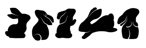 Ensemble Vectoriel Silhouettes Noires Lapins Dans Différentes Poses Ombres Lièvres — Image vectorielle
