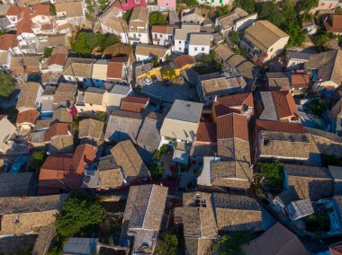 Aerial drone  Cityscape  view of traditional mountain village Liapades at Corfu Island Greece.  clipart