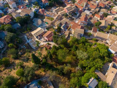 Aerial drone  Cityscape  view of traditional mountain village Liapades at Corfu Island Greece.  clipart