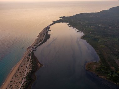 Aerial drone photo of Halikounas Beach separated Lake Korission and Ionian Sea on Corfu Island in Greece clipart