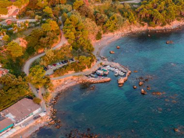 Aerial drone view over Pelekas Kontogialos beach at sunset. Corfu, Greece. clipart