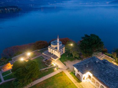 Aerial view of Ioannina city in Greece, Aslan Pasha Tzami, the lake with the island of Kyra Frosini or nissaki clipart