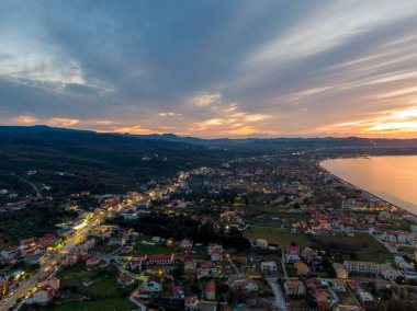 aerial view of a small villlage of acharavi  by night in north corfu,Greece clipart