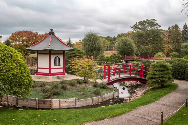 stock image fall colors at normandale japanese gardens on a cloudy day in bloomington