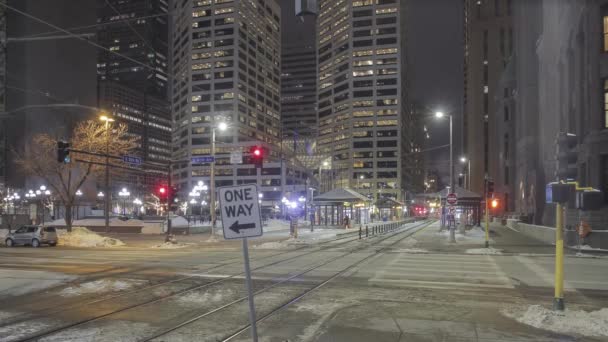 One Way Sign Lower Left Third Frame Train Blurring Downtown — Stok Video