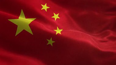 Çin 'in vatansever kumaş bayrağını sallıyor.