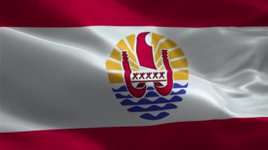 Fransız Polinezyası 'nın vatansever kumaş bayrağını sallıyor.