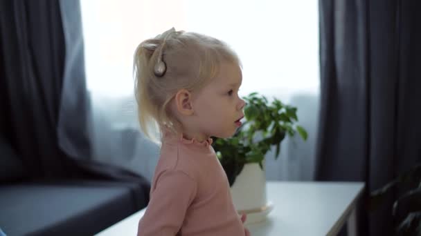 Girl Cochlear Implant Watches Hears Sounds — Stock Video