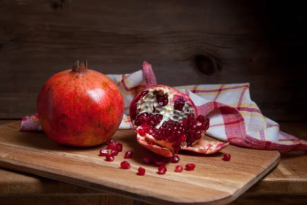 Composition Ripe Red Pomegranate Cracked Pomegranate Wooden Background Close View — Stock Photo, Image