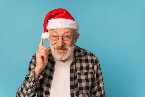 stock image Portrait of happy Santa Claus excited looking at camera and holds small christmas tree