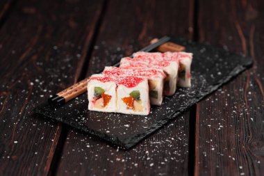 Asian dessert maki sushi - Roll with fruits and cream cheese