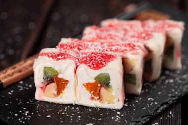 Asian dessert maki sushi - Roll with fruits and cream cheese